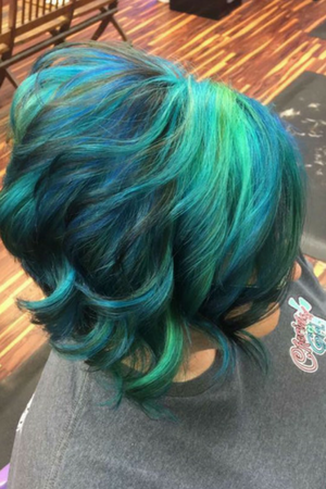 Blue hair coloring and cute shaggy pixie cut